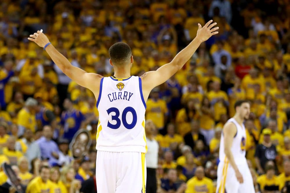 Stephen Curry of the Golden State Warriors celebrates against the Cleveland Cavaliers during the second quarter in Game 5 of the 2016 NBA Finals at ORACLE Arena on June 13, 2016 in Oakland, California. (Ezra Shaw/Getty Images)