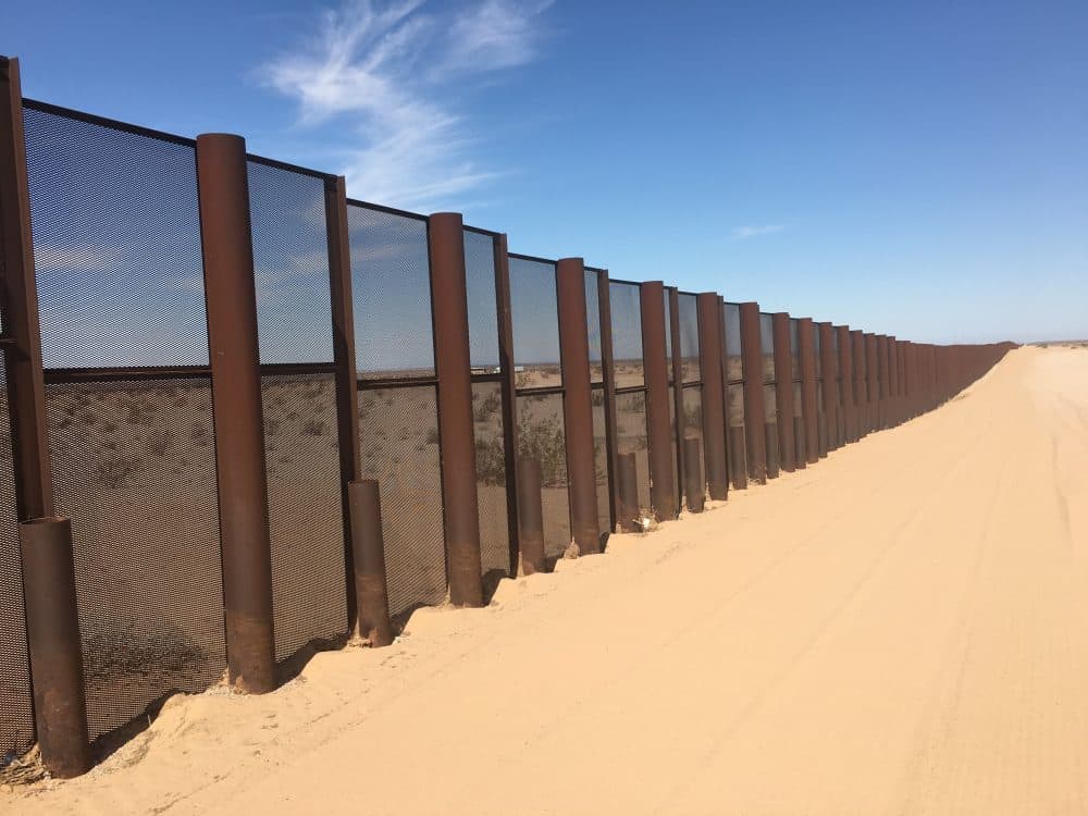 The border fence runs about $6.5 million per mile. It's worked to staunch the flow of illegal entries by Mexicans but now Yuma is seeing a rise in Central Americans crossing this fence in search of asylum.
(Michel Marizco/KJZZ)