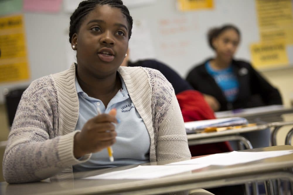 Jermida Horton, 14, is engaged in the Law Day session at the Lilla Frederick Middle School. She said she's considering becoming a lawyer in the future. (Jesse Costa/WBUR)