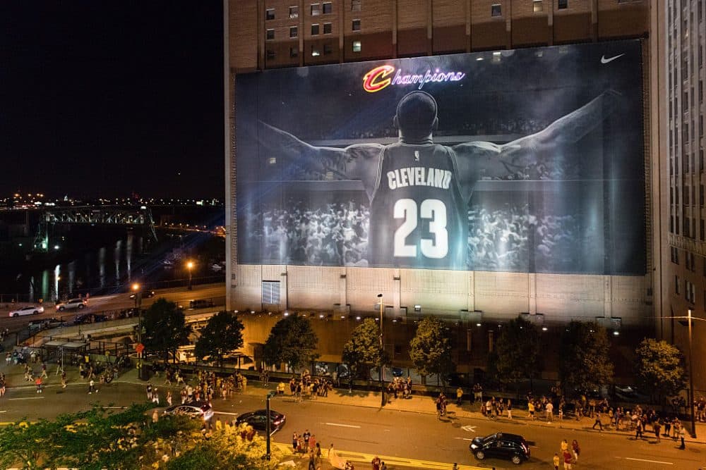 Fans react in downtown Cleveland after the Cleveland Cavaliers won the NBA Championship on June 19, 2016 in Cleveland, Ohio. (Jason Miller/Getty Images)
