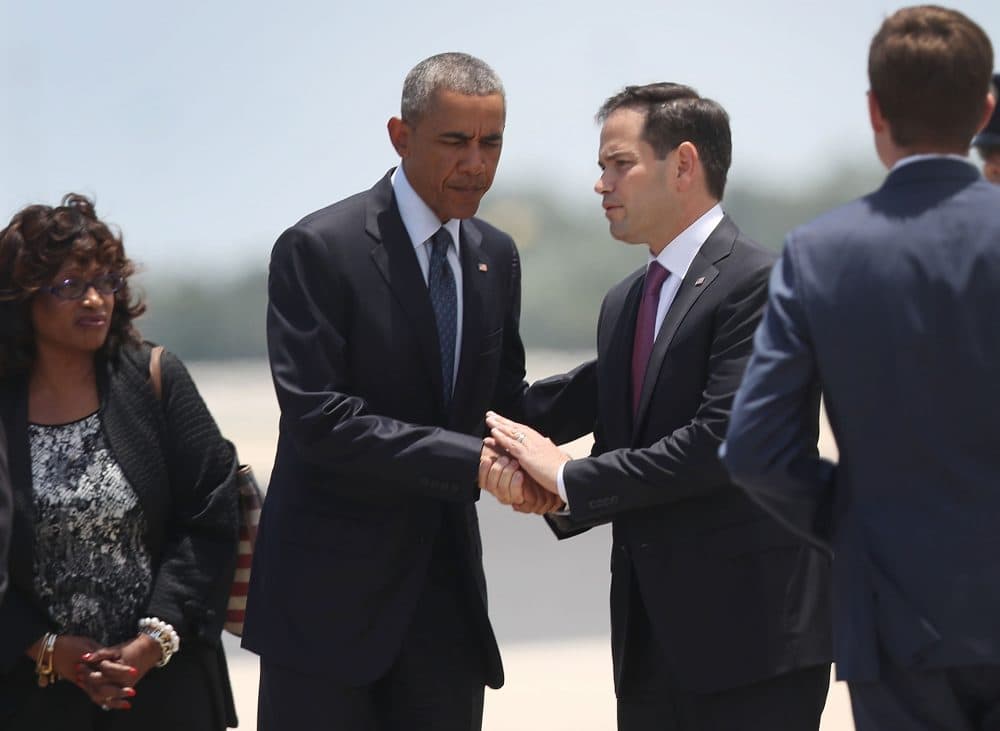 President Barack Obama shakes hands with Sen. Marco Rubio (R-FL) after they arrive at the Orlando International Airport to visit with family and community members after the attack at the Pulse gay nightclub where Omar Mateen killed 49 people on June 16, 2016 in Orlando, Florida. The mass shooting on June 12th killed 49 people and injured 53 others in what is the deadliest mass shooting in the country's history.  (Joe Raedle/Getty Images)