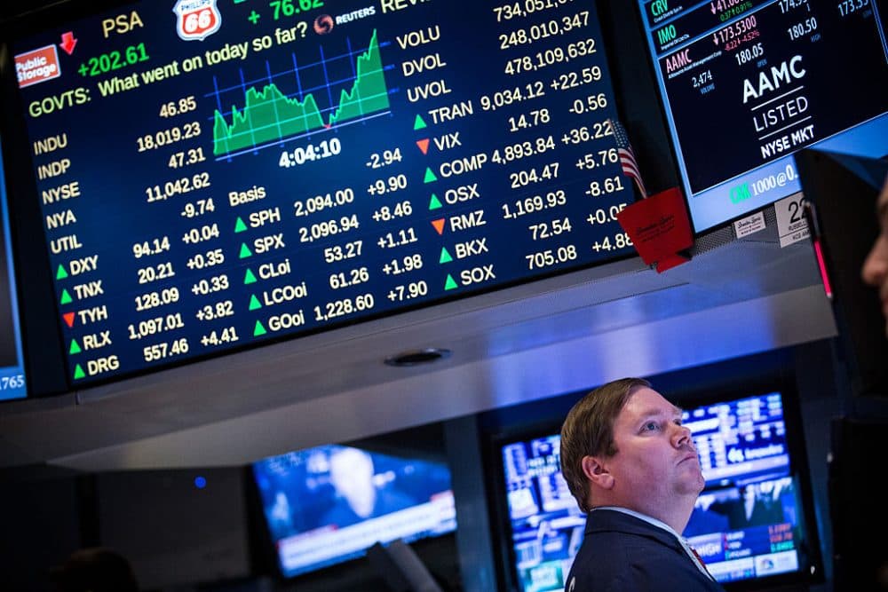 A trader works on the floor of the New York Stock Exchange during the afternoon of February 13, 2015 in New York City. (Andrew Burton/Getty Images)