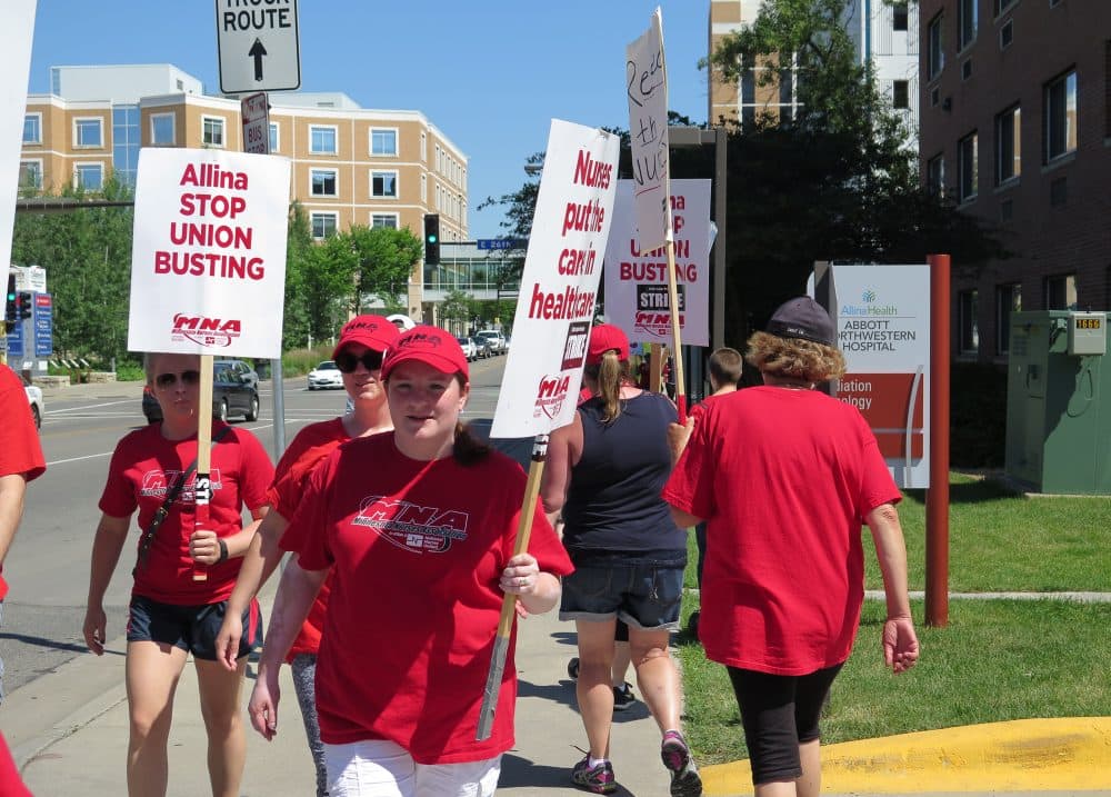 Registered nurse Kellie Weikle protests outside Abbott Northwestern Hospital in Minneapolis, Minnesota on June 23, 2016. (Courtesy/Mark Zdechlik/MPR)