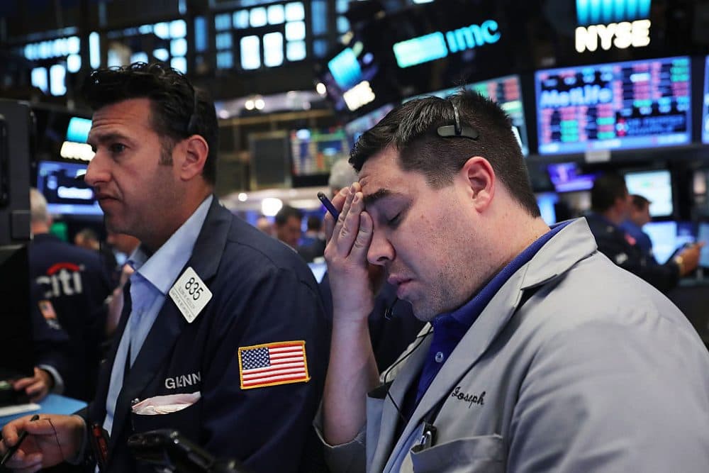 Traders work on the floor of the New York Stock Exchange (NYSE) following news that the United Kingdom has voted to leave the European Union on June 24, 2016 in New York City. The Dow Jones industrial average quickly fell nearly 500 points on the news with markets around the globe plunging. (Spencer Platt/Getty Images)