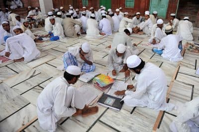 In this picture taken on September 7, 2011 Muslim students prepare for their entry exams on campus of the Darul Uloom Deoband school of Islam. The 145-year-old Darululoom Deoband situated in the sleepy town of Deoband in north Indian state of Uttar Pradesh is acknowledged as the spiritual home for conservative Deobandi school of Islam and their methodology is followed by religious schools in Asia, Middle East, Britain and the United States. (Sajjad Hussain/ Getty Images)