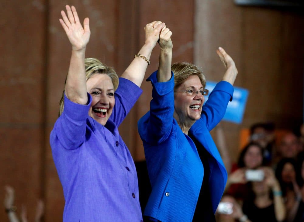 Democratic Presidential candidate Hillary Clinton (L) and U.S. Sen Elizabeth Warren (D-MA) (R) wave to the crowd before a campaign rally at the Cincinnati Museum Center at Union Terminal June 27, 2016 in Cincinnati, Ohio. Warren is helping Clinton campaign in Ohio.   (John Sommers II/Getty Images)