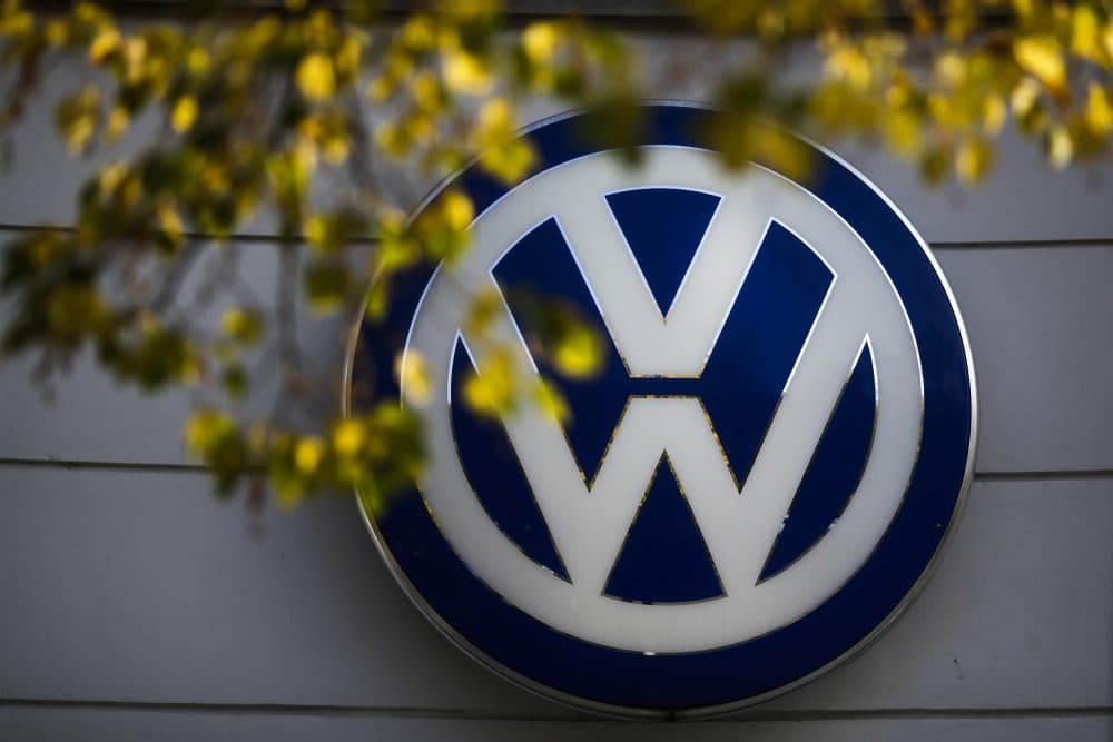 The VW sign of Germany's Volkswagen car company is displayed at the building of a company's retailer in Berlin. (Markus Schreiber/AP)