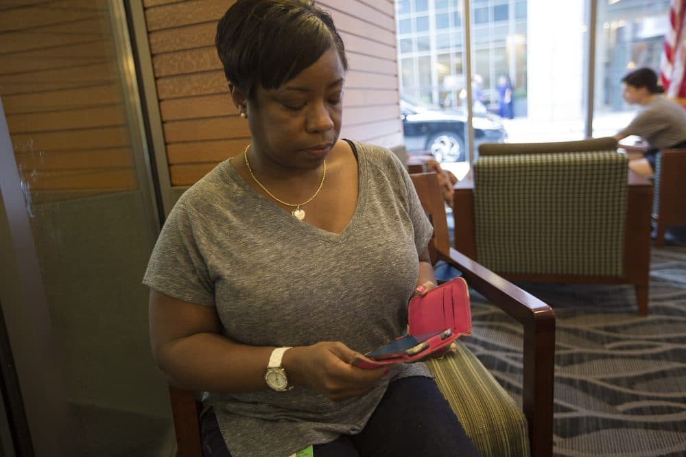 During her lunch break, Marcia Chesterfield leaves a voice message on the Cogito Companion app. (Jesse Costa/WBUR)