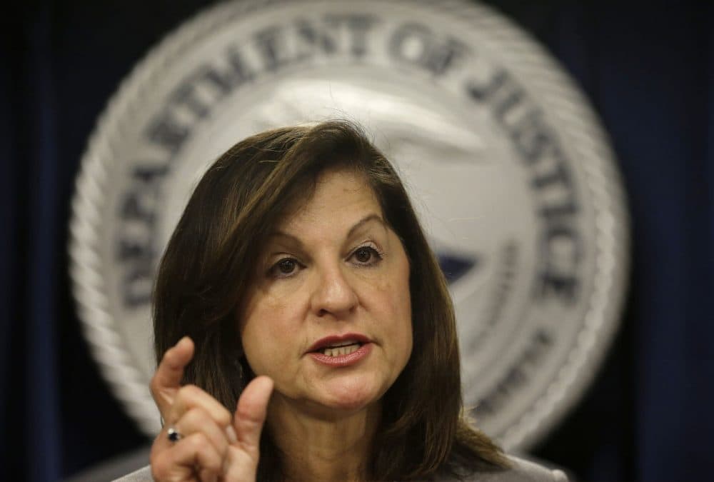 U.S. Attorney Carmen Ortiz responds to questions during a news conference in Boston. (Steven Senne/AP)