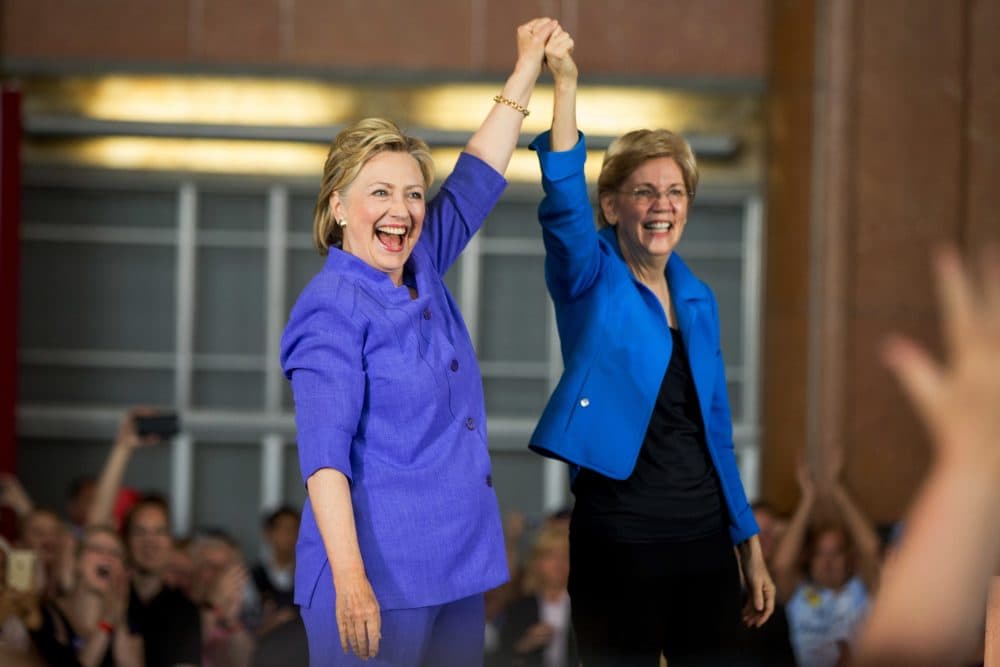 Democratic presidential candidate Hillary Clinton, accompanied by Sen. Elizabeth Warren, D-Mass., arrives to speak  in Cincinnati, Monday, June 27, 2016. (Andrew Harnik/AP)