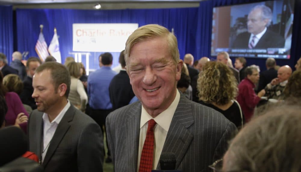 Former Massachusetts Gov. Bill Weld smiles as he talks to a reporter at a 2014 event. (Stephan Savoia/AP)