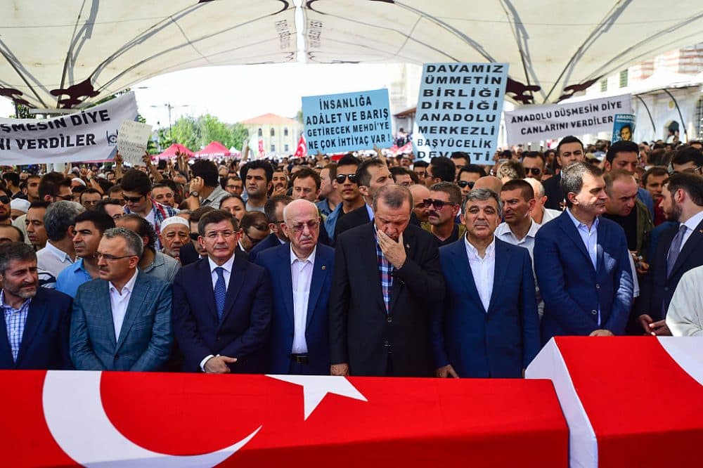 Former Turkish President Abdullah Gul (R), Turkish President Recep Tayyip Erdogan (2nd R), Turkey's Grand National Assembly President Ismail Kahraman (C) and former PM Ahmet Davutoglu attend the funeral service for victims of the thwarted coup in Istanbul at Fatih mosque on July 17, 2016 in Istanbul, Turkey. Clean up operations are continuing in the aftermath of Friday's failed military coup attempt which claimed the lives of more than 250 people. In raids across Turkey 6,000 people have been arrested in relation to the failed coup including high-ranking soldiers and judges, Turkey's Justice Minister Bekir Bozdag has said. (Burak Kara/Getty Images)