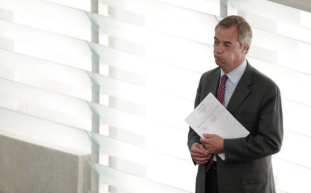Former leader of the United Kingdom Independence Party (UKIP) Nigel Farage reacts as he arrives for a voting session at the European Parliament during the monthly session at the EU Parliament in Strasbourg, on July 5, 2016. European Commission head Jean-Claude Juncker sharply criticized politicians Nigel Farage and Boris Johnson as the &quot;sad heroes&quot; of Brexit who backed out of leading Britain through the EU exit they had campaigned for. &quot;Patriots don't resign when things get difficult, they stay,&quot; he added. (Frederick Florin /AFP/Getty Images)