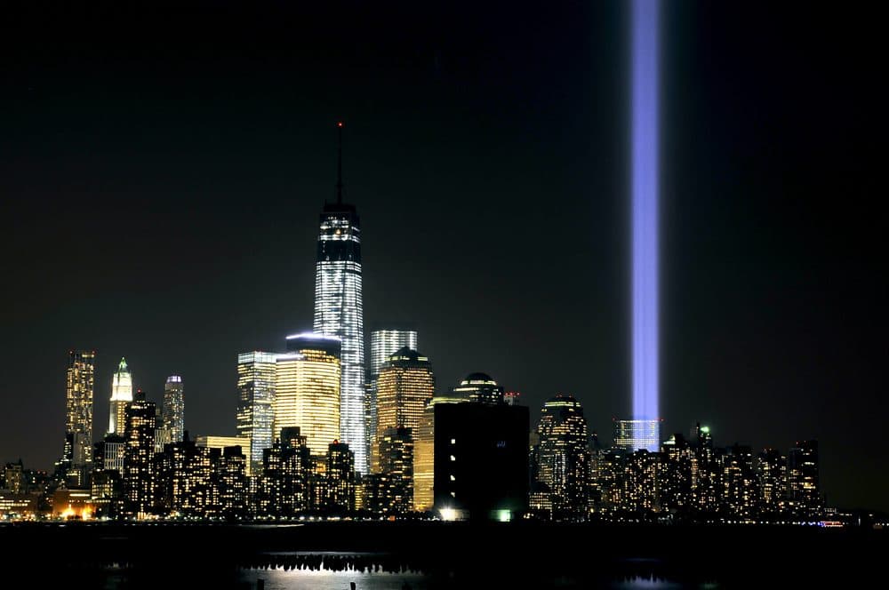 The &quot;Tribute in Light&quot; shines from the Manhattan skyline next to One World Trade Center to commemorate all those who were lost on 9/11 on September 11, 2013 in Hoboken, New Jersey. The lights are located at West and Morris streets in lower Manhattan. The nation is commemorating the anniversary of the 2001 attacks which resulted in the deaths of nearly 3,000 people after two hijacked planes crashed into the World Trade Center, one into the Pentagon in Arlington, Virginia and one crash landed in Shanksville, Pennsylvania. (Michael Bocchieri/Getty Images)