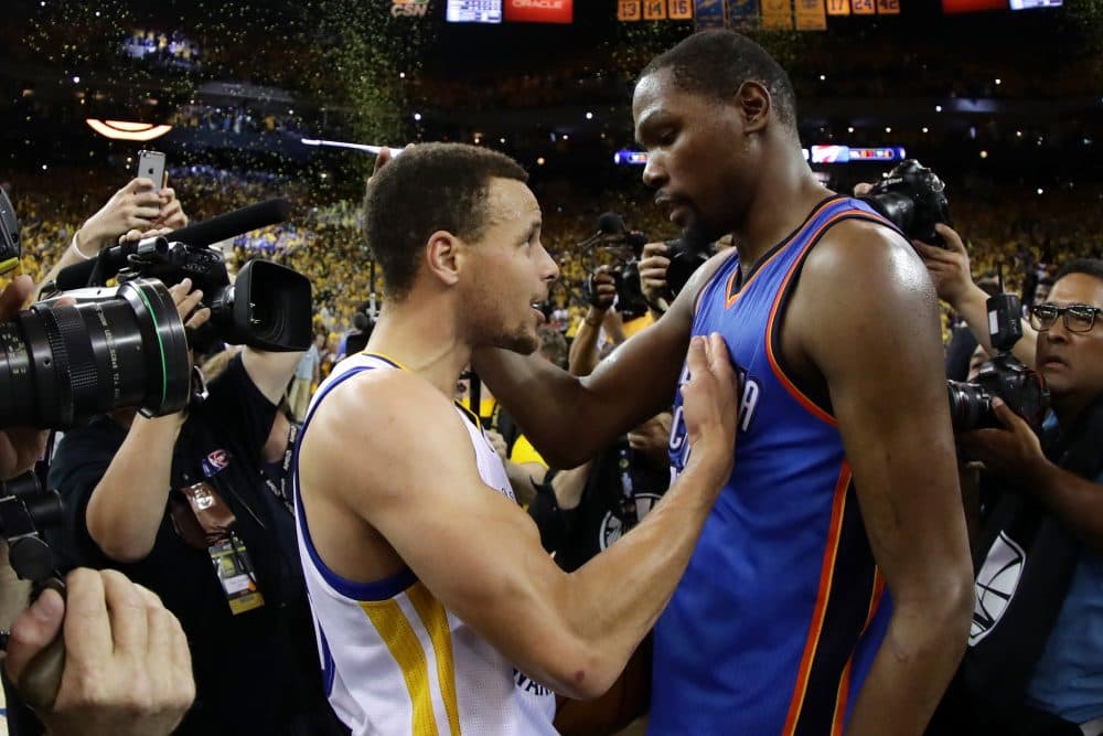 Kevin Durant (right) is joining Stephen Curry (left) on the Golden State Warriors. Durant and Curry have combined for the last three NBA MVP awards. (Ezra Shaw/Getty Images)
