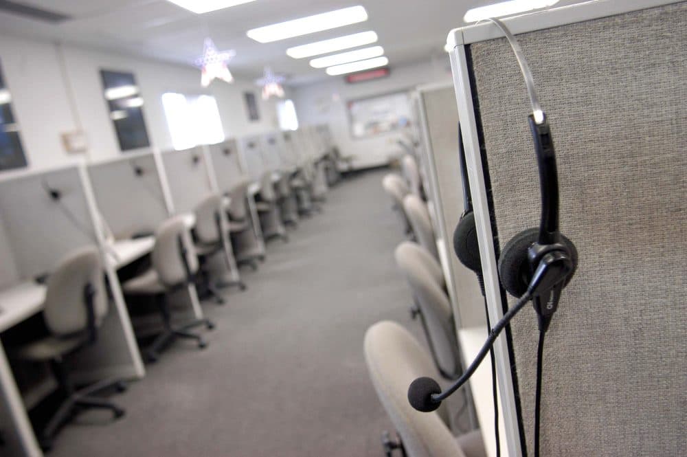 A headset hangs on a cubical wall after the last telemarketing shift at Spectrum Marketing Services, Inc. September 26, 2003 in Philadelphia, Pennsylvania. (William Thomas Cain/Getty Images)