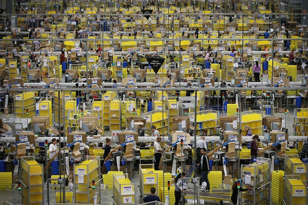Parcels are prepared for dispatch at Amazon's warehouse on December 5, 2014 in Hemel Hempstead, England. (Peter Macdiarmid/Getty Images)
