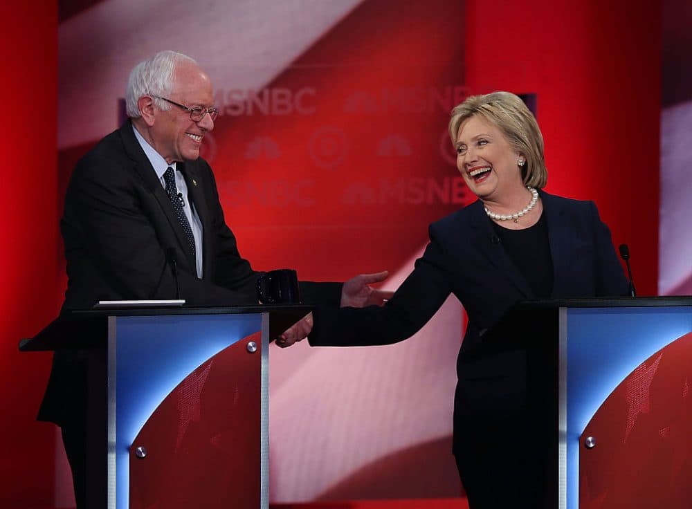 Democratic presidential candidates former Secretary of State Hillary Clinton and U.S. Sen. Bernie Sanders shake hands during their MSNBC Democratic Candidates Debate at the University of New Hampshire on February 4, 2016 in Durham, New Hampshire. (Justin Sullivan/Getty Images)