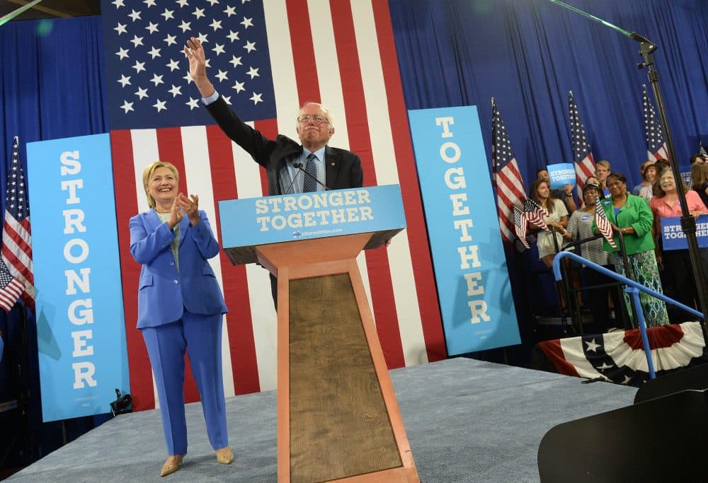Bernie Sanders campaigns with presumptive Democratic presidential nominee Hillary Clinton at Portsmouth High School July 12, 2016 in Portsmouth, New Hampshire. Sanders endorsed Clinton for president of the United States. (Darren McCollester/Getty Images)