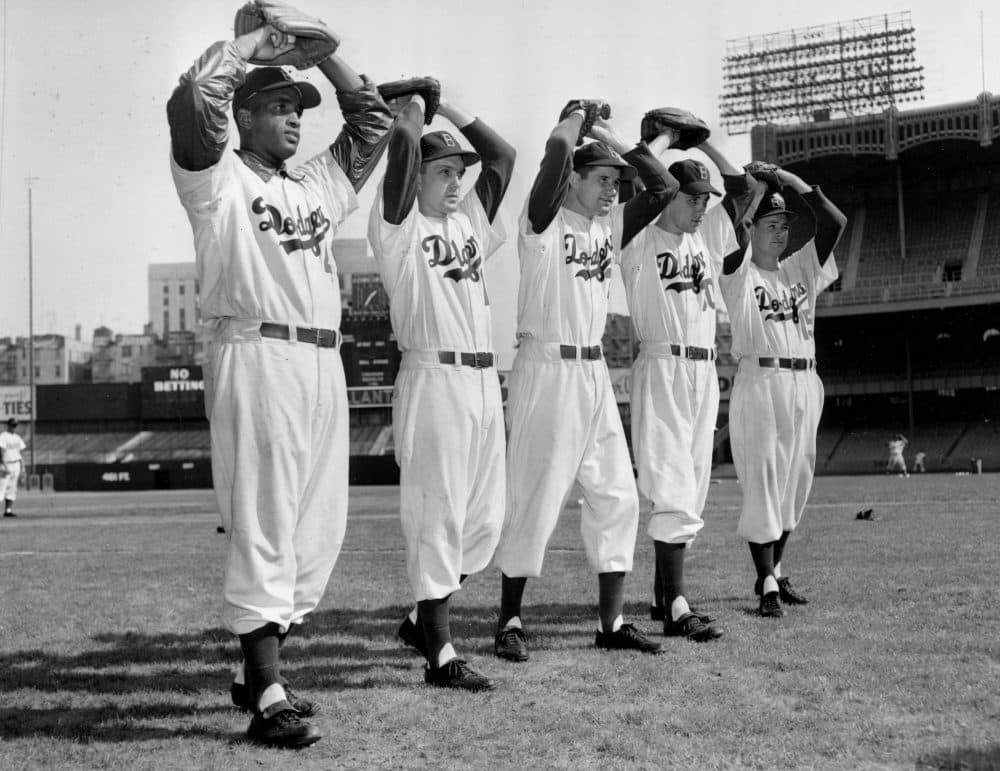 Carl Erskine (second from left) credits his progressive racial attitudes to his childhood friendship with Johnny Wilson. (AP Photo)