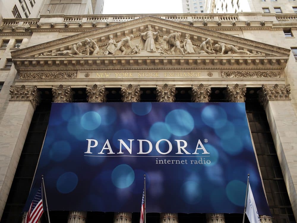 A banner for Pandora Media Inc., the online-radio company, hangs in front of the New York Stock Exchange walk on its first day of trading as a public company on June 15, 2011 in New York City. (Spencer Platt/Getty Images)