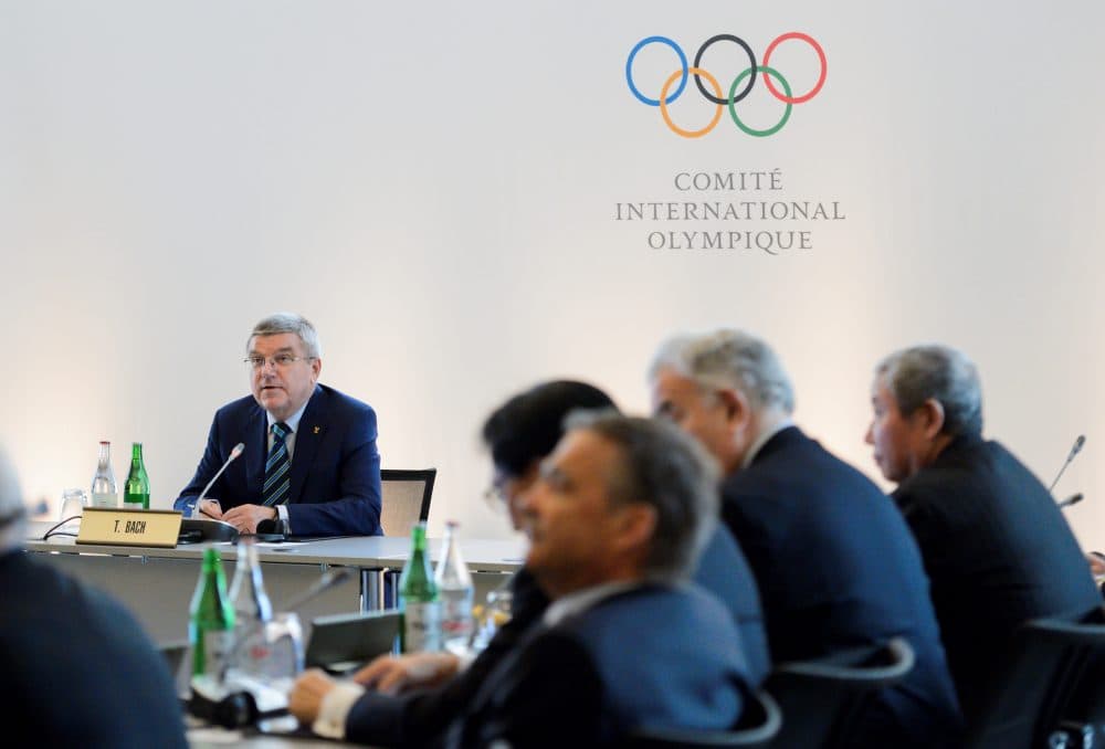 International Olympic Committee (IOC) president Thomas Bach (L) attends an Olympic summit on June 21, 2016 in Lausanne. For Russia's track and field stars, the meeting of Olympic executives may offer the last chance to compete at the Games in Rio de Janeiro. Last week, the International Association of Athletics Federations (IAAF) upheld a ban on Russian athletes, first imposed in November, following revelations of state-sponsored doping and massive corruption riddling the nation's track and field programme. (FABRICE COFFRINI/AFP/Getty Images)