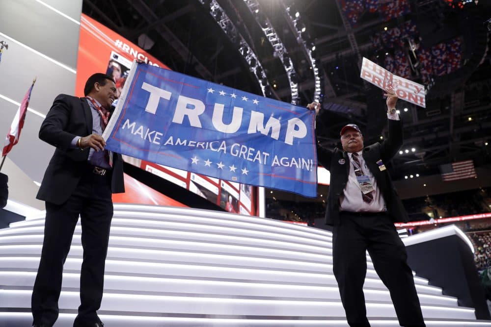 Trump supporters cheer during first day of the Republican National Convention in Cleveland Monday. (Matt Rourke/AP)