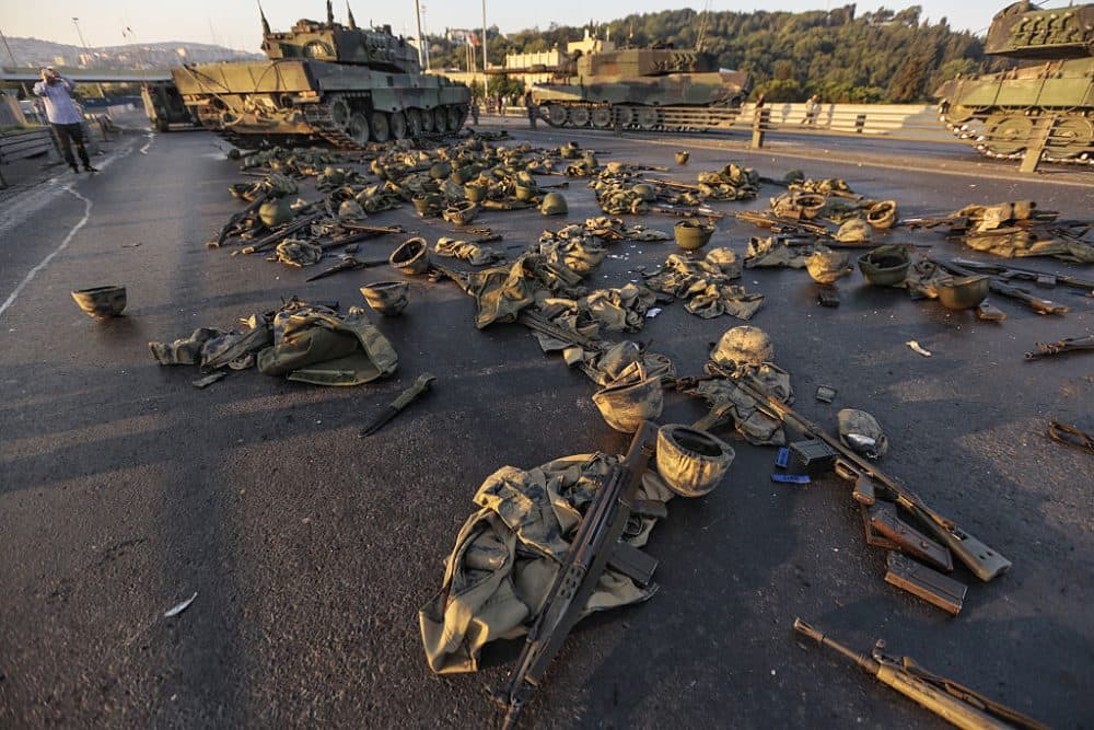 Clothes and weapons belonging to soldiers involved in the coup attempt that have now surrendered lie on the ground abandoned on Bosphorus Bridge on July 16, 2016, Istanbul, Turkey. (Gokhan Tan/Getty Images)