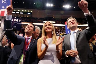 Donald Trump Jr. (L), along with Ivanka Trump (C) and Eric Trump (R), take part in the roll call in support of Republican presidential candidate Donald Trump on the second day of the Republican National Convention on July 19, 2016 at the Quicken Loans Arena in Cleveland, Ohio. (Joe Raedle/Getty Images)