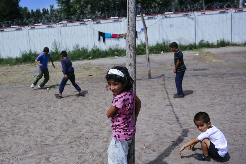 Children play at a migrant camp situated on the Serbia-Hungary border in Horgos on July 8, 2016. 
Exhausted but hopeful, hundreds of migrants defy summer heat in a makeshift camp on the Serbia-Hungary border, determined to reach the EU member despite tough new measures aimed at stopping them. (Alexa Stankovic/AFP/Getty Images)