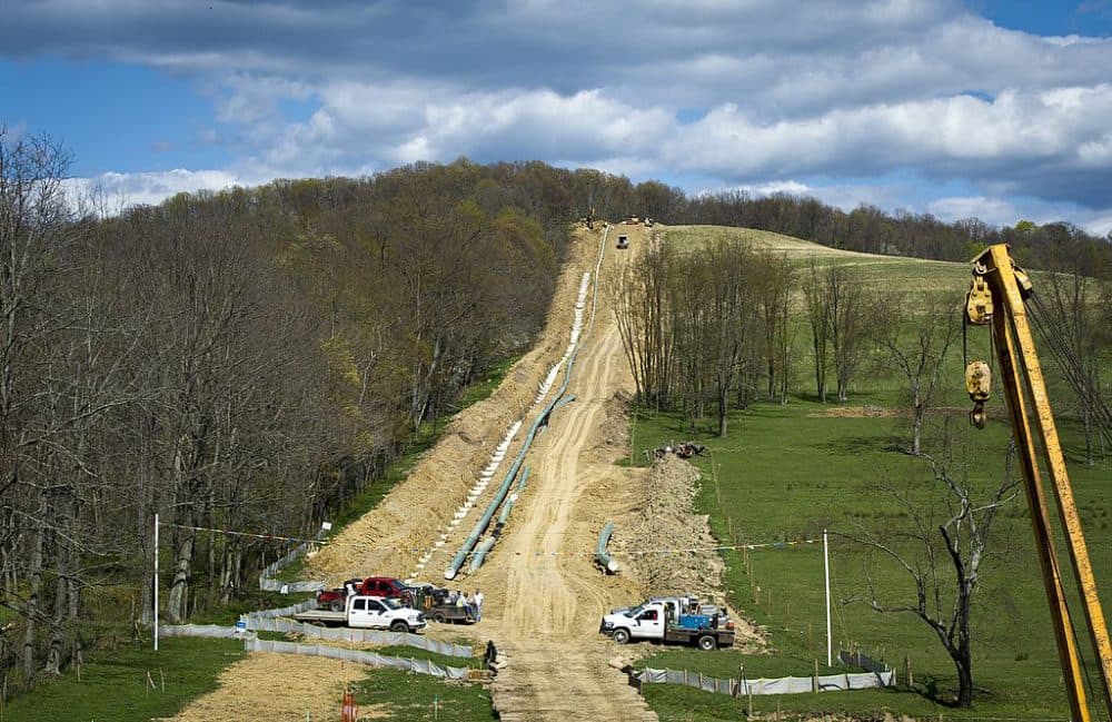 US-Energy-Gas-Environment Workers lay the pipes of a gas pipeline outside the town of Waynesburg, PA on April 13, 2012.It is estimated that more than 500 trillion cubic feet of shale gas is contained in this stretch of rock that runs through parts of Pennsylvania, New York, Ohio and West Virginia. (Mladen Antonov/AFP/Getty)