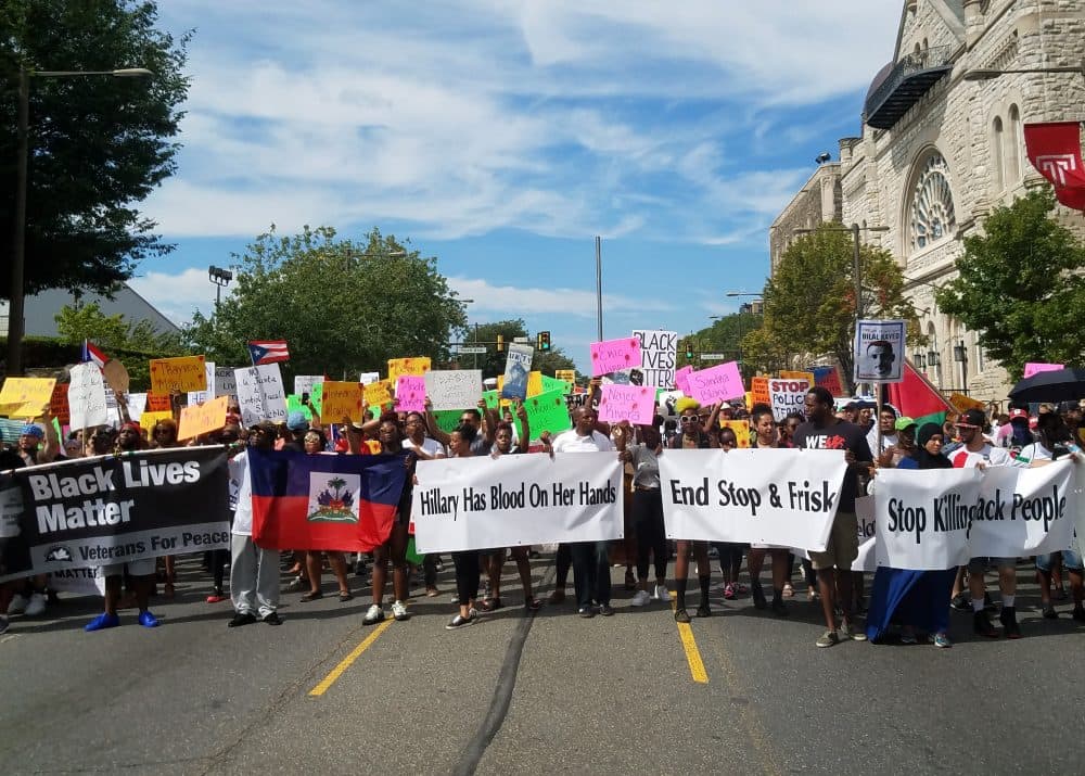 Demonstrators marched down Broad Street in Philadelphia to protest police brutality. With the Democratic National Convention underway, protesters say politicians need to do more to help minority communities. (Zeninjor Enwemeka/WBUR)