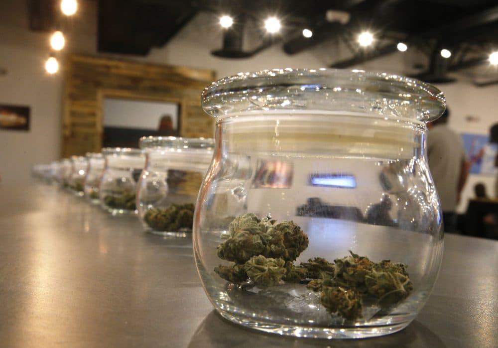 Marijuana for sale kept in jars for customers to sample smells at a recreational marijuana store in Aurora, Colorado. (Brennan Linsley/AP)