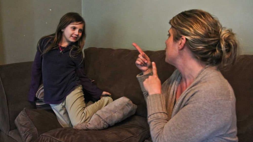 Sophie, an eight-year-old with cochlear implants, and her mom Samantha Zawislak. (Elizabeth Fiedler/WHYY)