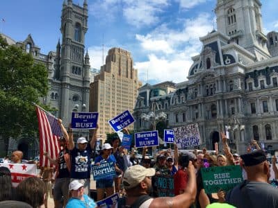 A crowd of people rally in Center City, Philadelphia, to promote third party unity during the DNC. (Shannon Dooling/WBUR)