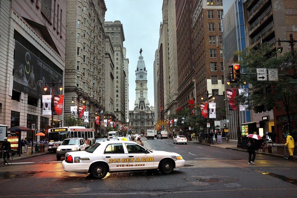 A cab drives through Philadelphia's downtown area on Oct. 22, 2014. (Spencer Platt/Getty Images)