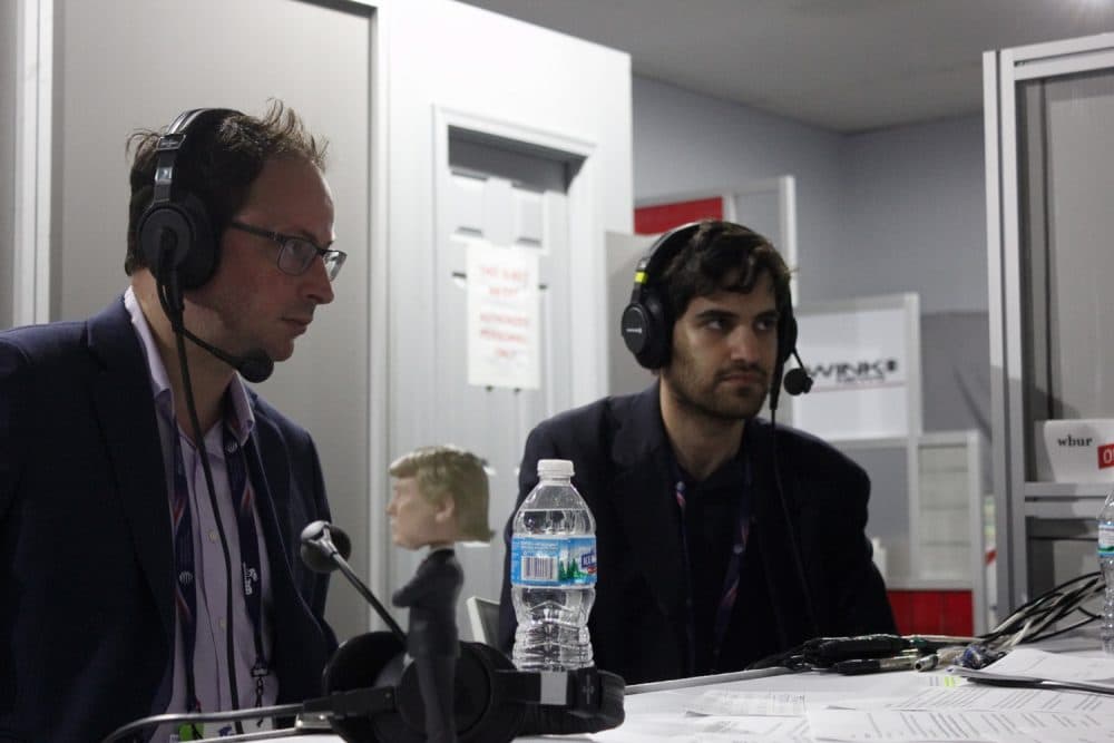 Nate Silver, founder and editor in chief of FiveThirtyEight, and Harry Enten, senior writer for FiveThirtyEight, speak with On Point host Tom Ashbrook at the Republican National Convention on Tuesday, July 19, 2016. (Katherine Brewer/WBUR)