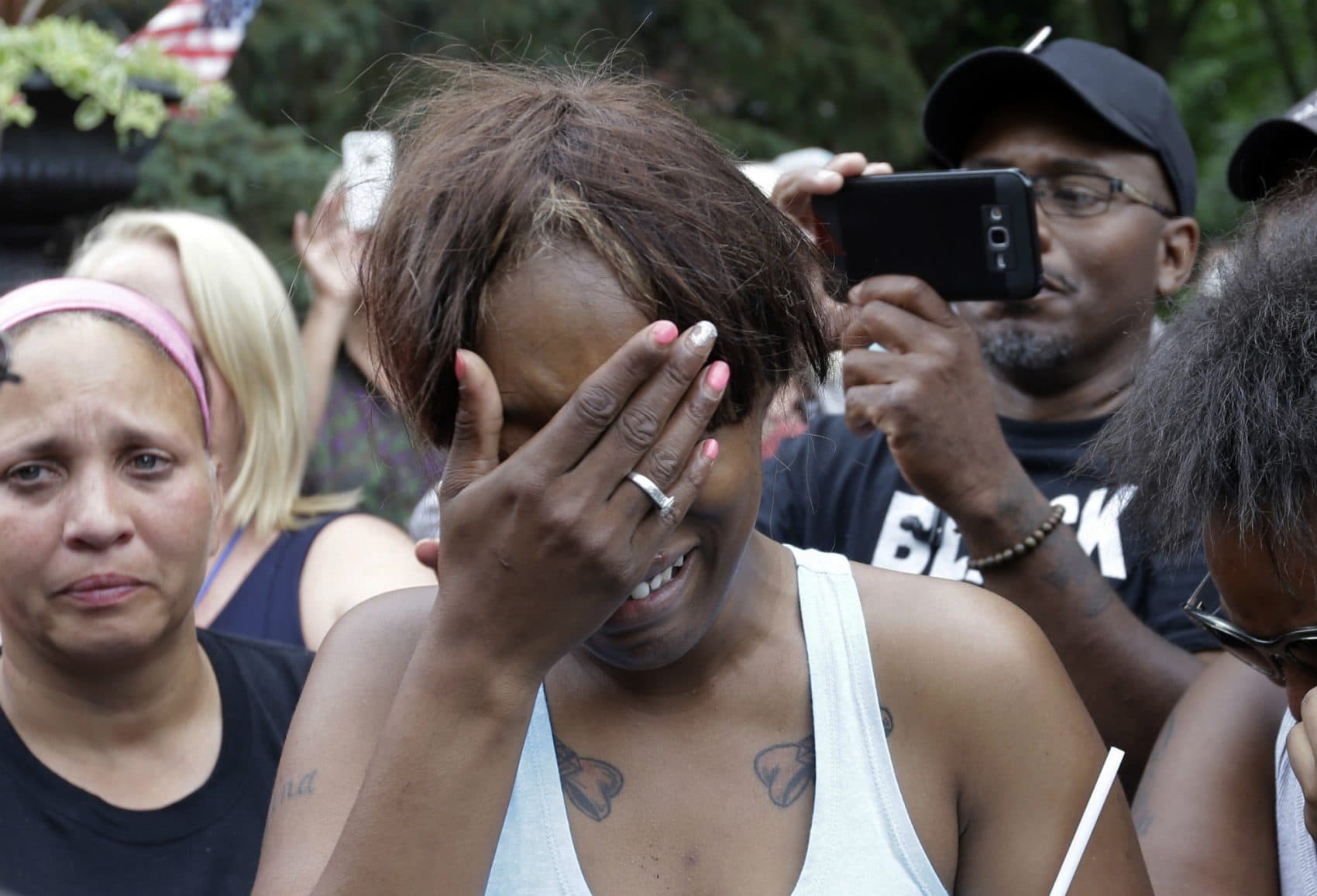 Diamond Reynolds, the girlfriend of Philando Castile, cries outside the governor's residence in St. Paul, Minn., on Thursday, July 7, 2016. Castile was shot and killed after a traffic stop by police in Falcon Heights, Wednesday night. A video shot by Reynolds of the shooting  went viral.  (Jim Mone/AP)