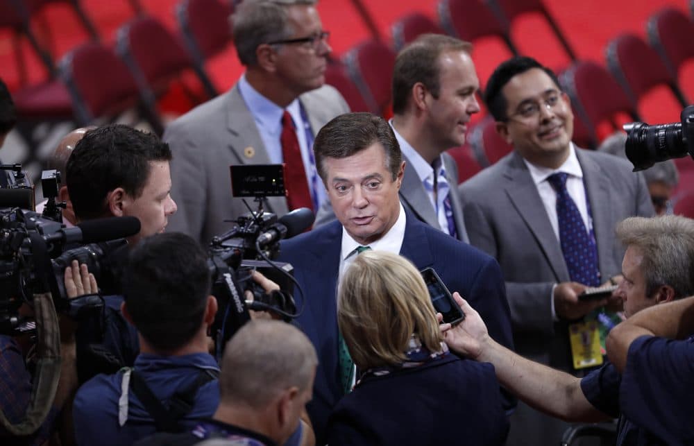 Trump campaign chairman Paul Manafort is surrounded by reporters on the floor of the Republican National Convention in Cleveland on Sunday. (J. Scott Applewhite/AP)