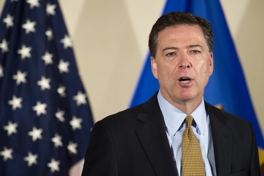 FBI Director James Comey at FBI Headquarters in Washington, Tuesday, said the FBI will not recommend criminal charges in its investigation into Hillary Clinton's use of a private email server while secretary of state. (Cliff Owen/AP)