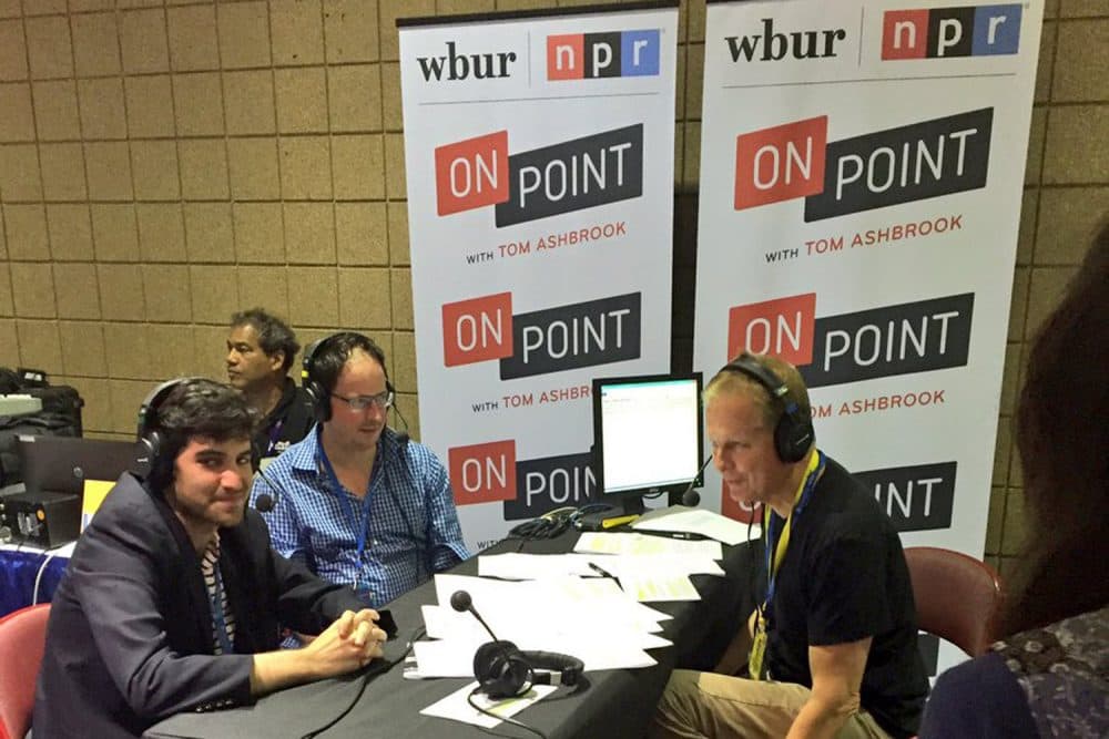 Host Tom Ashbrook is joined by FiveThirtyEight's Harry Enten (Left) and Nate Silver (right) at the 2016 Democratic National Convention in Philadelphia. (Abbie Ruzicka/WBUR)
