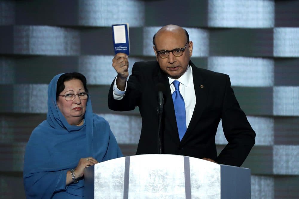 Khizr Khan, father of deceased Muslim U.S. Soldier Humayun S. M. Khan, holds up a booklet of the US Constitution as he delivers remarks on the fourth day of the Democratic National Convention at the Wells Fargo Center, July 28, 2016 in Philadelphia, Pennsylvania. (Alex Wong/Getty Images)