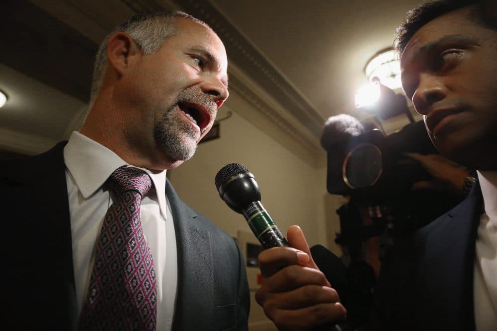 Rep. Tim Huelskamp (R-KS) (L) talks to reporters in the Longworth Building on Capitol Hill October 28, 2015 in Washington, D.C. (Chip Somodevilla/Getty Images)