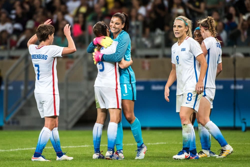 USA players celebrate after the Rio 2016 Olympic Games first round Group G women's football match United States vs New Zealand at the Mineirao stadium in Belo Horizonte, Brazil on Aug. 3, 2016. (Gustavo Andrade/AFP/Getty Images)