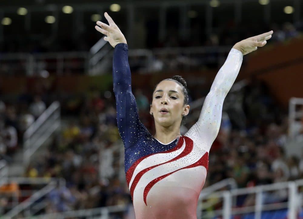 United States' Aly Raisman performs on the balance beam during the artistic gymnastics women's team final at the 2016 Summer Olympics in Rio de Janeiro, Brazil, Tuesday, Aug. 9, 2016. (Rebecca Blackwell/AP)