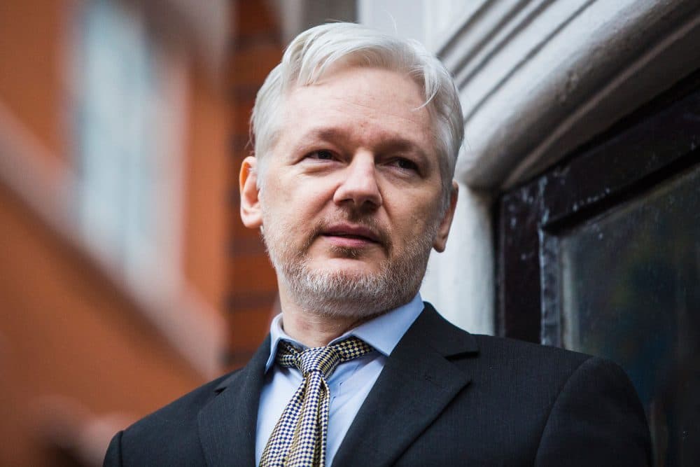 WikiLeaks founder Julian Assange addresses the media from the balcony of the Ecuadorian embassy in central London on Feb. 5, 2016. (Jack Taylor/AFP/Getty Images)