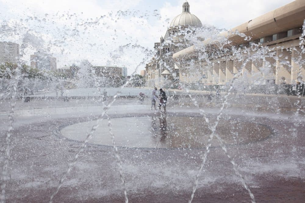 People played in the fountains at the Christian Science Center during Boston's heat wave this week. (Joe Difazio/WBUR)