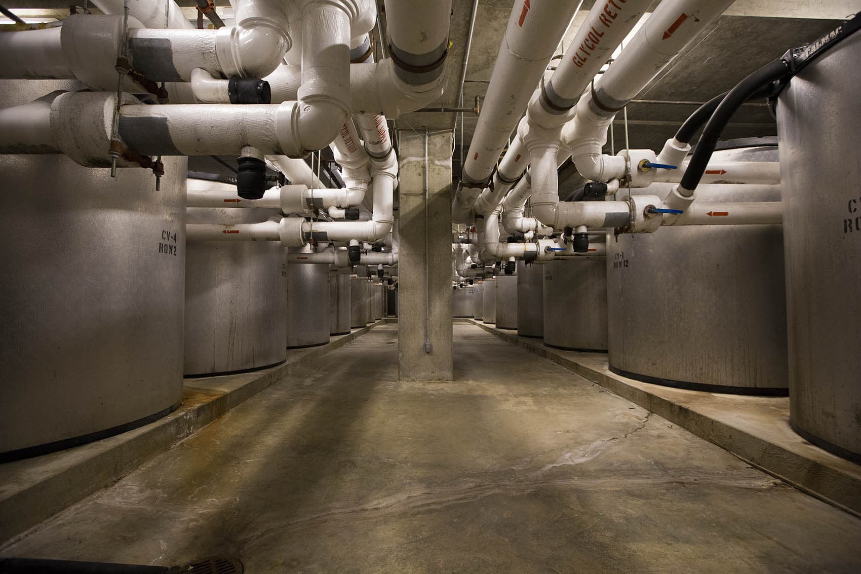 Sixty-five IceBank Energy Storage tanks in the basement of the Moakley Courthouse in Boston. (Jesse Costa/WBUR)