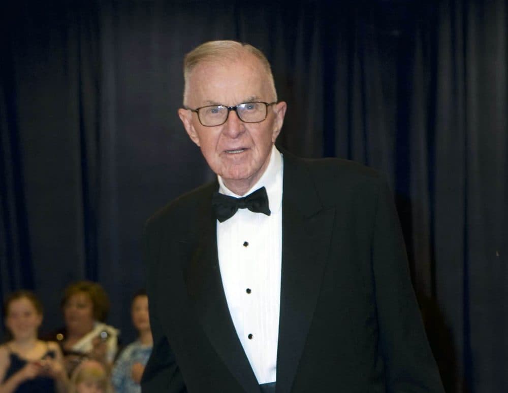 In this April 28, 2012, photo, John McLaughlin arrives at the White House Correspondents' Association Dinner on in Washington. McLaughlin, the conservative political commentator and host of the namesake long-running television show that pioneered hollering-heads discussions of Washington politics, died Tuesday, Aug. 16, 2016. He was 89. (Kevin Wolf/AP)