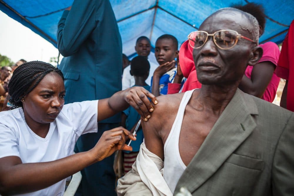 A man gets a yellow fever vaccine during a ceremony launching a response campaign against yellow fever in the district of Kisenso, Kinshasa, on July 20, 2016. (Eduardo Soteras/AFP/Getty Images)